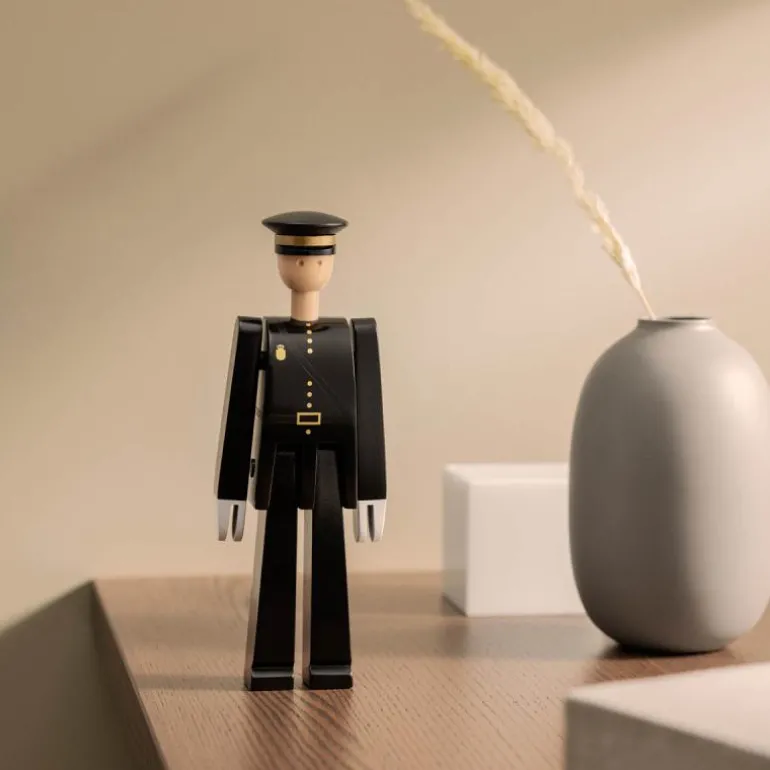 Politimann svart